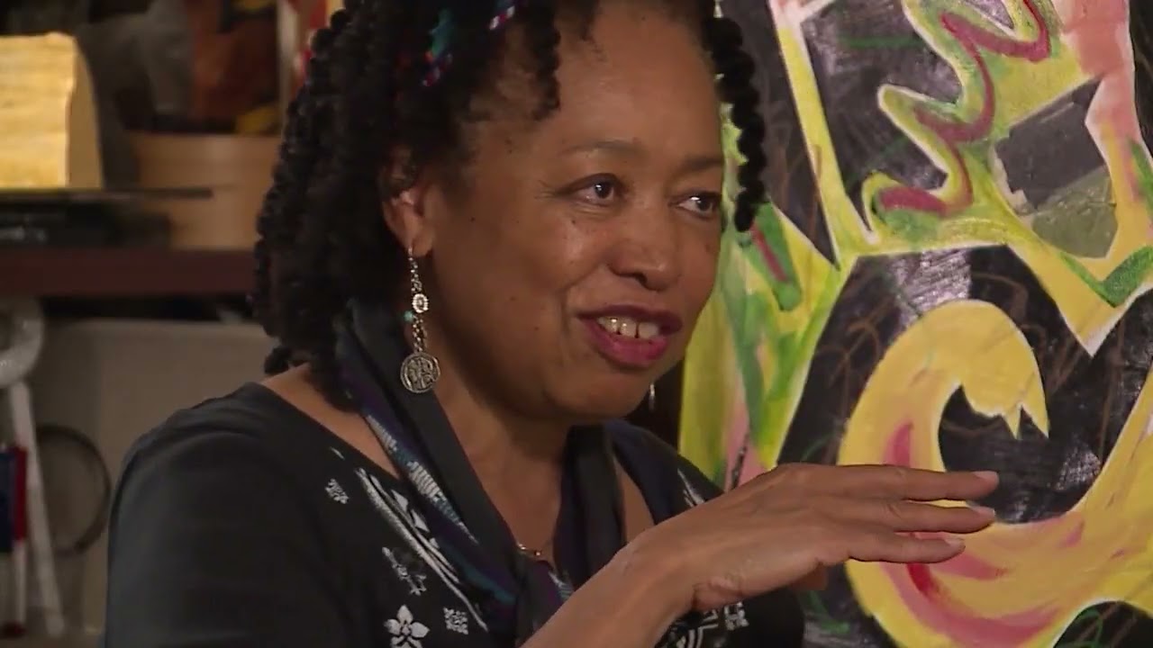 The Mural Artist of Tiana's Bayou Adventure attraction