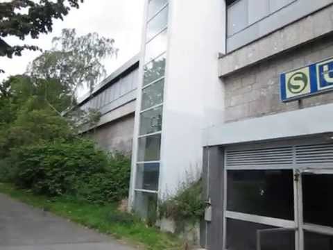 ThyssenKrupp traction glass elevator at Stadthaus railway and subway station in Dortmund