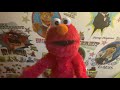 Elmo Sings Right In The Middle Of The Face