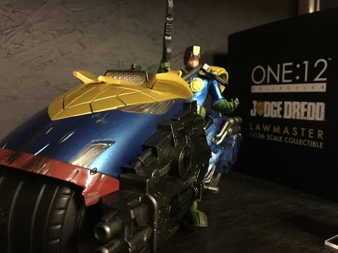 Pierre of Mezco shows off the lights and sounds on the One:12 scale Judge Dredd Lawmaster