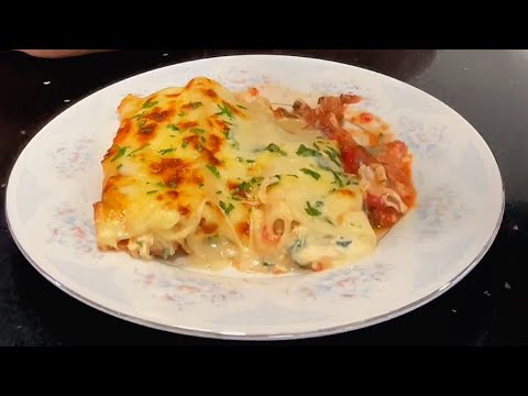Canelones de pollo y requesón en salsa de tomate. Receta de la abuela