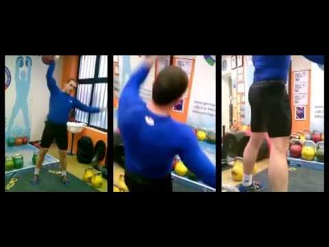 Ivan Denisov demonstrates his kettlebell snatch technique with the 32 kg kettlebell