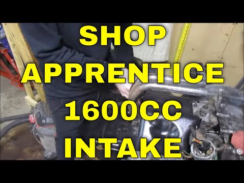 SHOP APPRENTICE LEARNS ABOUT FUEL INJECTED INTAKE ON AIRCOOLED 1600CC VW ENGINE