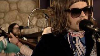 2003 KINGS OF LEON - WICKER CHAIR