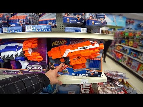 Buying Christmas Gifts at Toys Shop Toys R Us