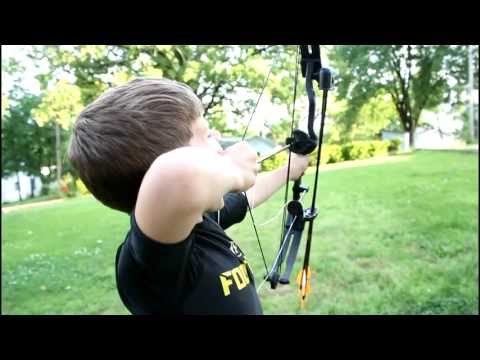 Funny kid videos - Carter Wise tooth pull.....with bow and arrow.