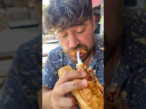 This CHICKEN SCARPARIELLO HOAGIE from Fugazzi in Charleston, SC is a MUST-DEVOUR. 🥖🔥 #DEVOURPOWER