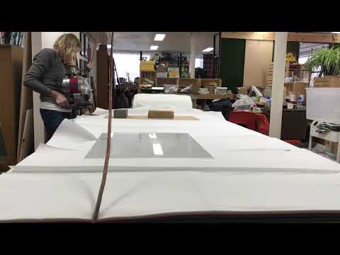 Fabric cutting with Eastman straight blade. Marley’s Monsters UNpaper towels