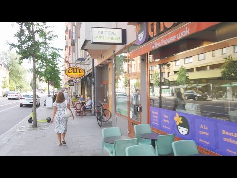 Tourist in Stockholm. Cycling from Årsta to Fotografiska. Eksinud turist Stockholmis.