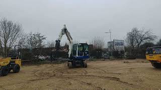 Pelle sur pneus Hyundai R55W-9A with 3 excavator buckets | Image 4 - Machineryline