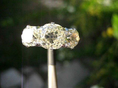 3-stone antique cushion diamond ring