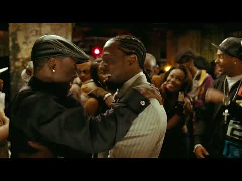 Trailer shot: stairwell pursuit as percussion rises—songs fall away, score takes over