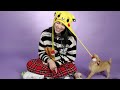 Billie Eilish Plays With Puppies While Answering Fan Questions