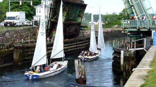 preview picture of video 'Outward Bound Sail Boats Trying to row Under the Blyman Bridge. Gloucester, Massachusetts'