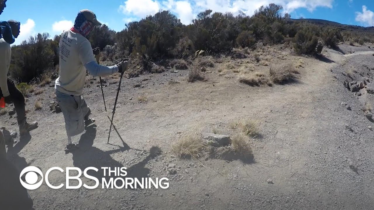 Wounded veteran takes journey of hope and determination up Mt. Kilimanjaro - YouTube