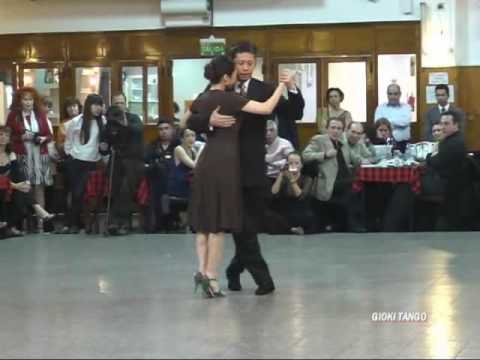  Kyoko Yamao  and  Hiroshi Yamao  are  dancing  to  the  tango  "  Cordobesita  "
