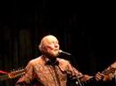 Pete Seeger singing "She'll be coming Around the mountain"