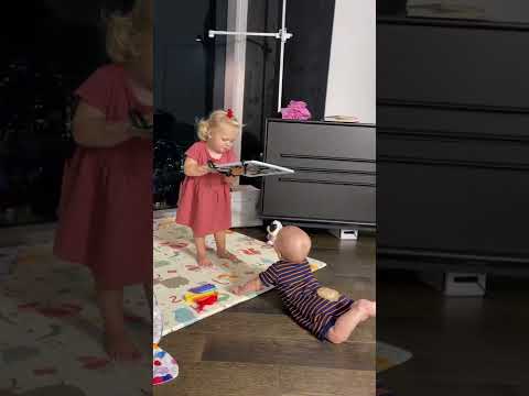 Naomi is playing with a mirror