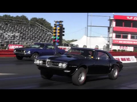 428 Cobra Jet Mustang vs Ram Air 400 Firebird 1/4 mile Drag Race - Road Test TV ®