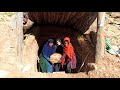 Grandmother and two orphan girls trying to build a cave
