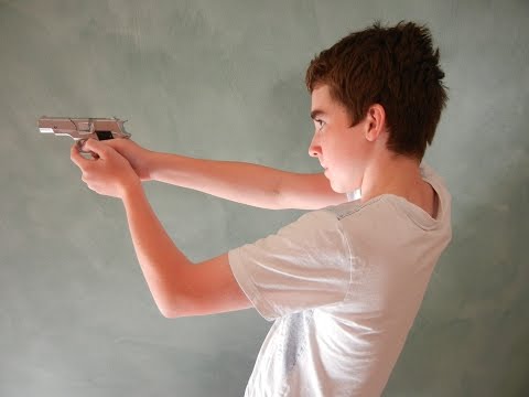 Toy colt .45 handgun showcase