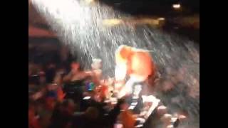 Toby Keith performing in the rain at Winstock 2014
