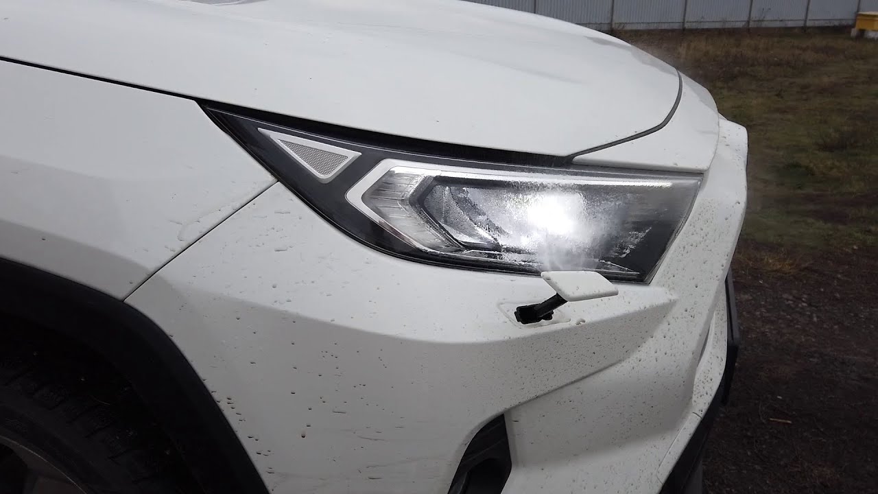 Как включить омыватель фар на Toyota RAV4?