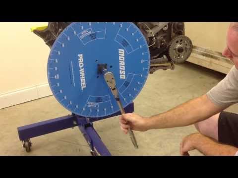 Finding top dead center using the degree wheel and piston stop