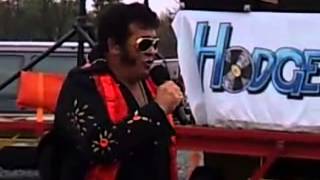 Manny Elvis sings you're so square and signs autographs