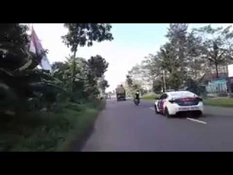 Police Chasing A Dancing Truck On The Road