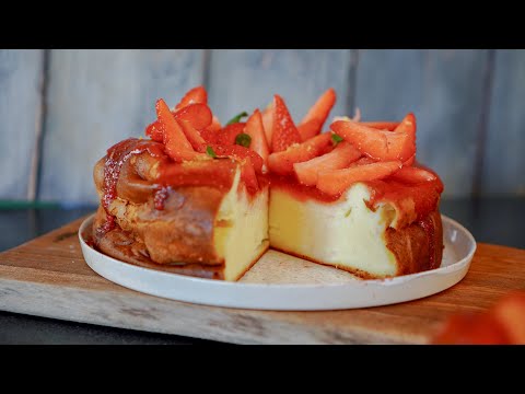 White cheese cake with strawberries and lemon