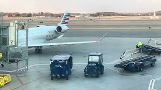 As American Airlines 1857 heads for take off and a private jet lands & taxis filmed February 29,2024