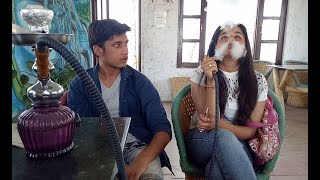 Indian Girl Smoking Hookah!