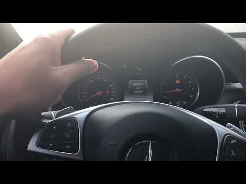 Part of a video titled MERCEDES-BENZ C 300 - HIGH BEAM LIGHTS - HOW TO TURN ON