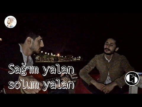 SAĞIM YALAN SOLUM YALAN -CİHAN ÖZCAN