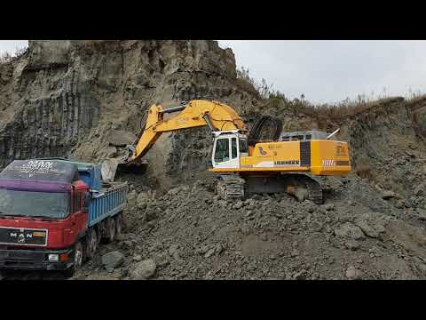 Liebherr 974 Excavator Loading Trucks