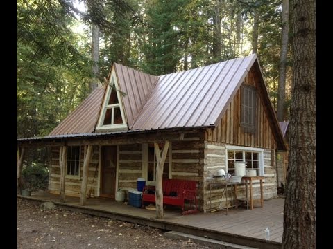 log cabin building-Hewing a cabin log