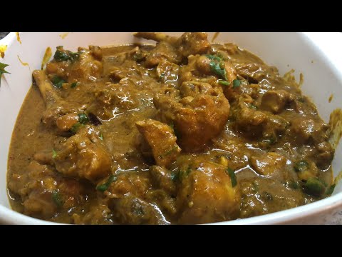 Guyanese girl making masala Chicken