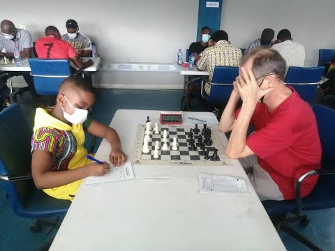 8-year-old chess champion, Dave, impresses at Senior Tournament.