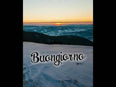 Buongiorno video con alba tra le montagne innevate