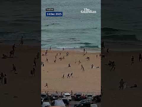 Surf camera in Australia shows beachgoers fleeing Bondi beach during shooting