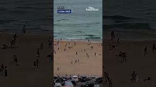 Download lagu Surf camera in Australia shows beachgoers fleeing Bondi beach during shooting mp3