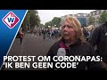 Demonstratie tegen coronapas in Den Haag: 'Ik ben een mens, geen code'