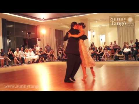  Lorena Ermocida  and  Oscar Martinez Pey  are  dancing  to  the  tango  "  Buscandote  "  by  Osvaldo Fresedo  at  Sunny Tango Festival  in  2013
