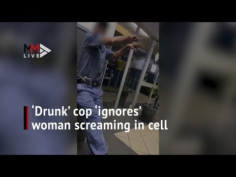 'If she dies, she dies' 'Drunk' cop 'ignores' woman and child's cries for help in holding cell.