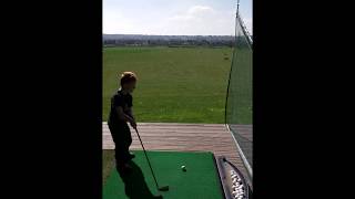 preview picture of video 'Charlie's first trip to the driving range'