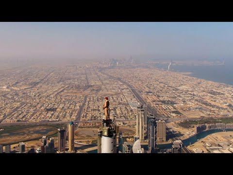Emirates Airline Had A Woman Stand On The Very Top Of The Burj Khalifa For An Ad. Here's How They Pulled It Off