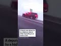 A deputy was almost hit by a highway rollover while responding to an earlier crash in North Dakota - Video