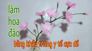 Làm hoa đào bằng khẩu trang y tế