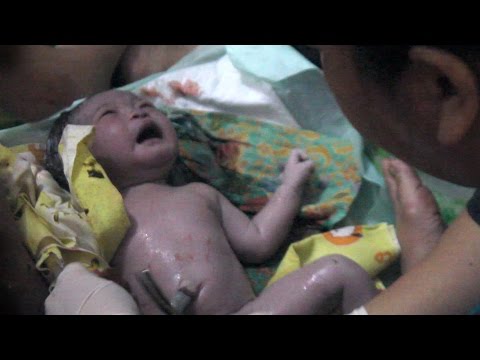 the process of a mother giving birth to a normal baby at home - giving birth story